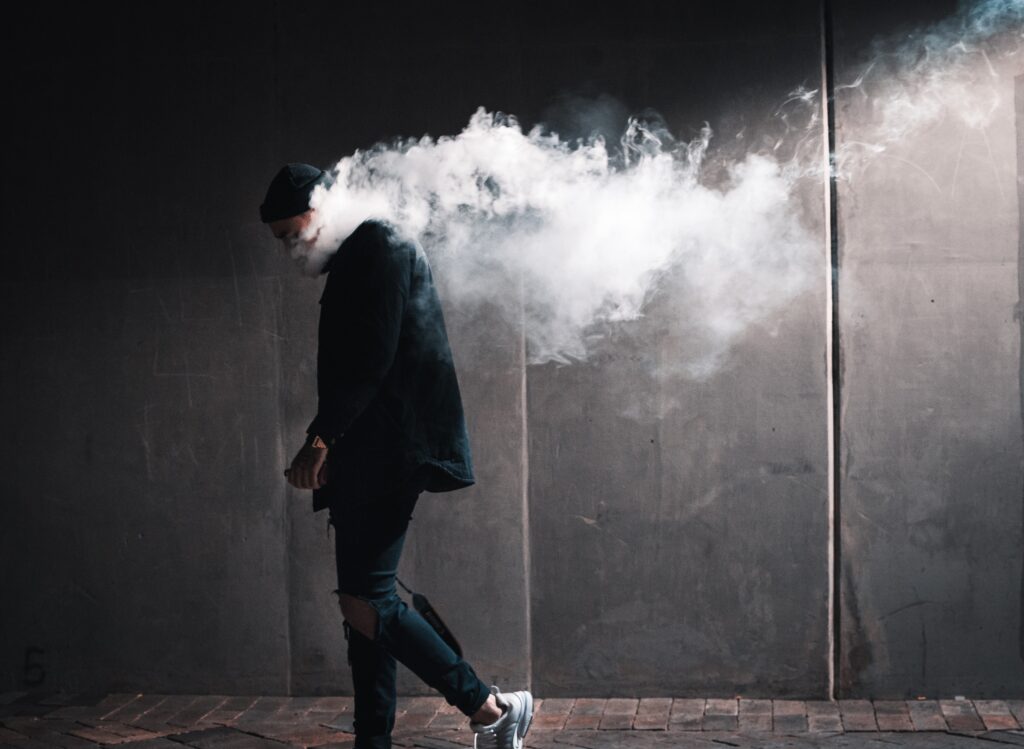 young man with vape